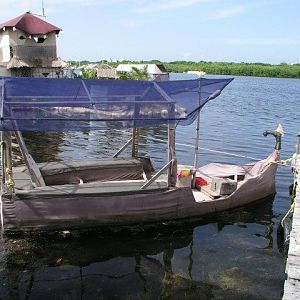 complete with ferry boat, also floating on reused water bottles