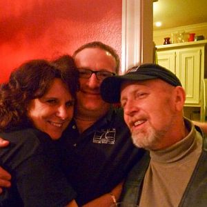 CHUM Holiday Parrrty Giles CHH and Hiedi Ho Group Hug