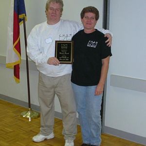Shadow Diver receiving her CHUM Diver of the Year award from ReefHound