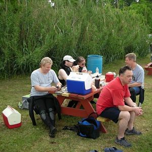 ReefHound checks the new CHUM facebook page while McLot stares angrily at t