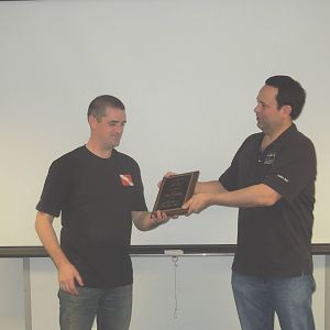 Sushi Boy presenting CHUM's Diver of the Year award to LegoBloxs