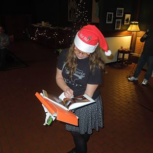 Elizabeth opens the Wet photo book