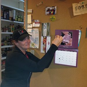 Vanessa makes the new year official by hanging the CHUM calendar