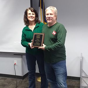 Heidi Ho presenting ReefHound with his Diver of the Year plaque