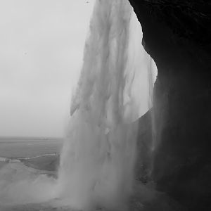 Behind the waterfall