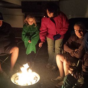 Heidi Ho teaches Vivie how to roast marshmallows