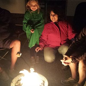 Vivie's 1st time roasting a marshmallow and eating s'mores