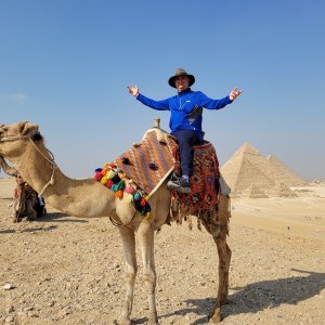 Riding a camel at the pyramids...
