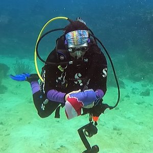 Lakediver folding up the flag