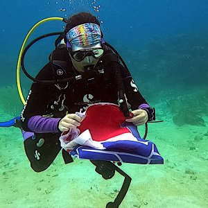 Lakediver folding up the flag
