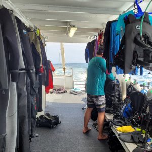 Roger on the dive deck packing