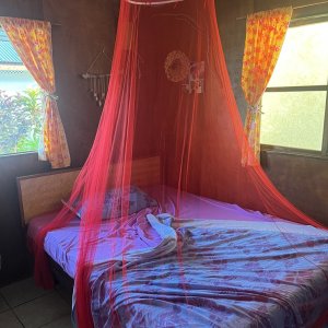 Fakarava hotel room with mosquito net