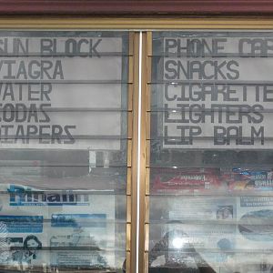 At the newspaper shop...