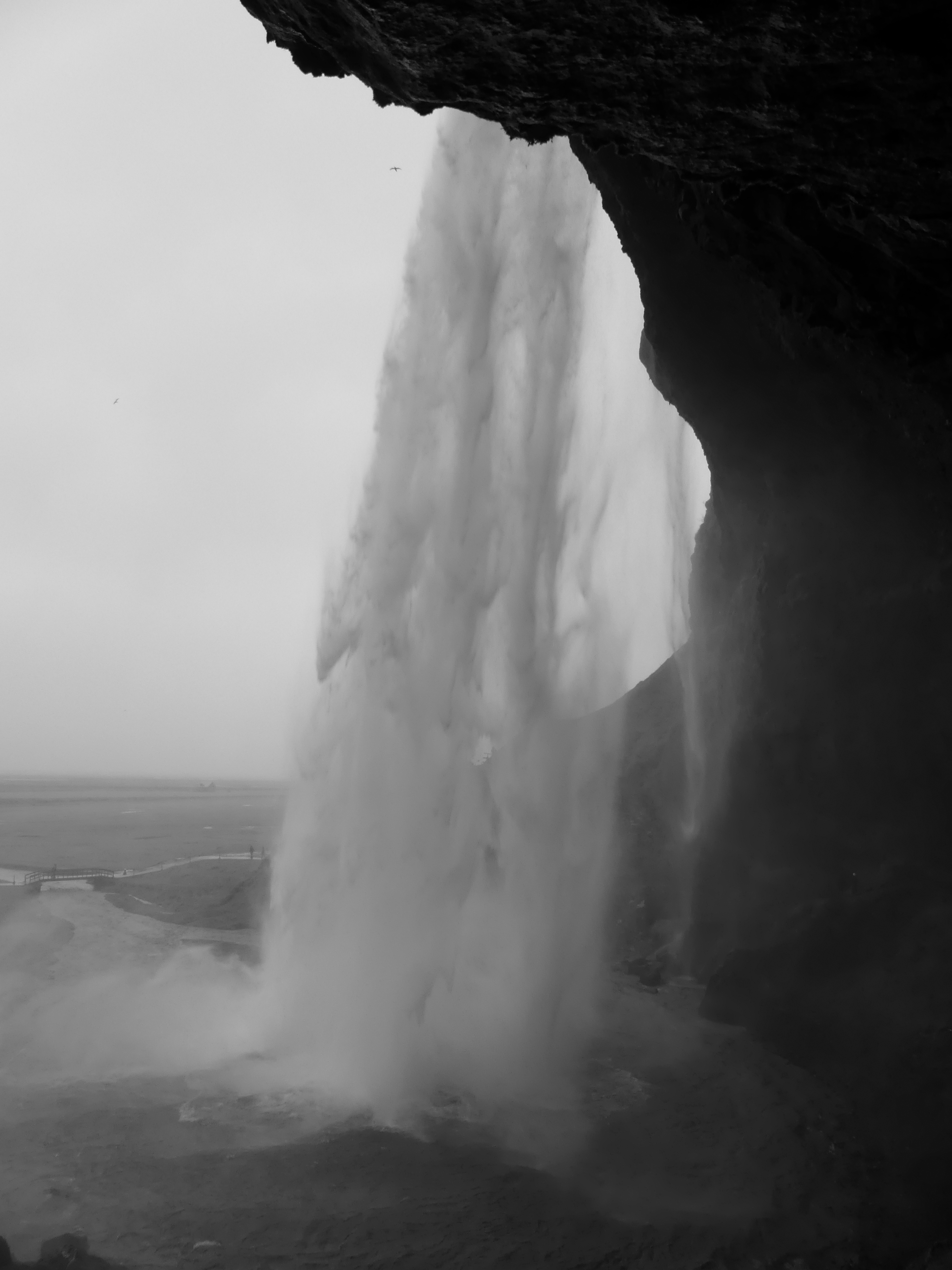Behind the waterfall