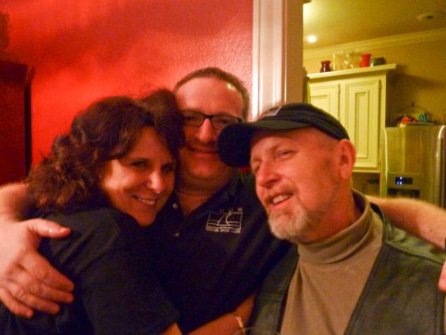 CHUM Holiday Parrrty Giles CHH and Hiedi Ho Group Hug