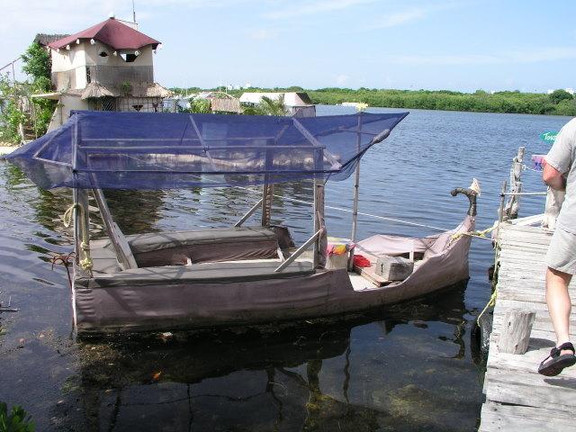 complete with ferry boat, also floating on reused water bottles
