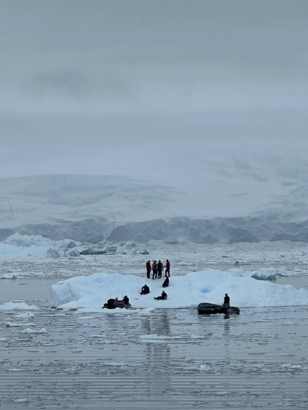 Divers on Ice, Antarctica.