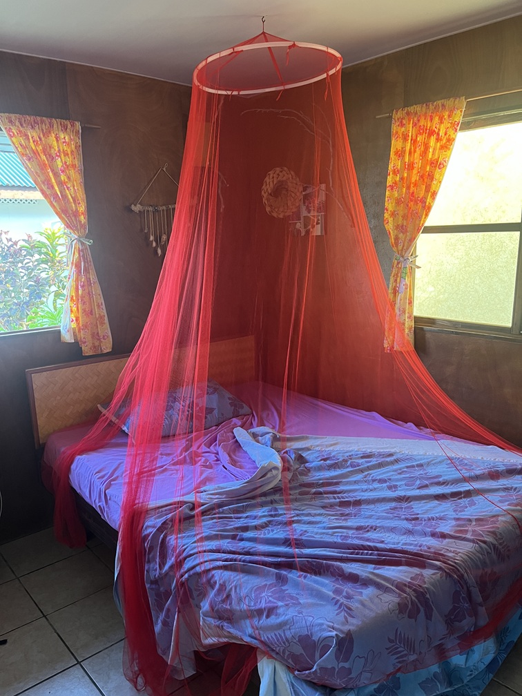 Fakarava hotel room with mosquito net