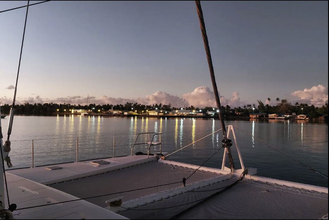 Fakarava - Rotoava at Dusk From Catamaran Itemata