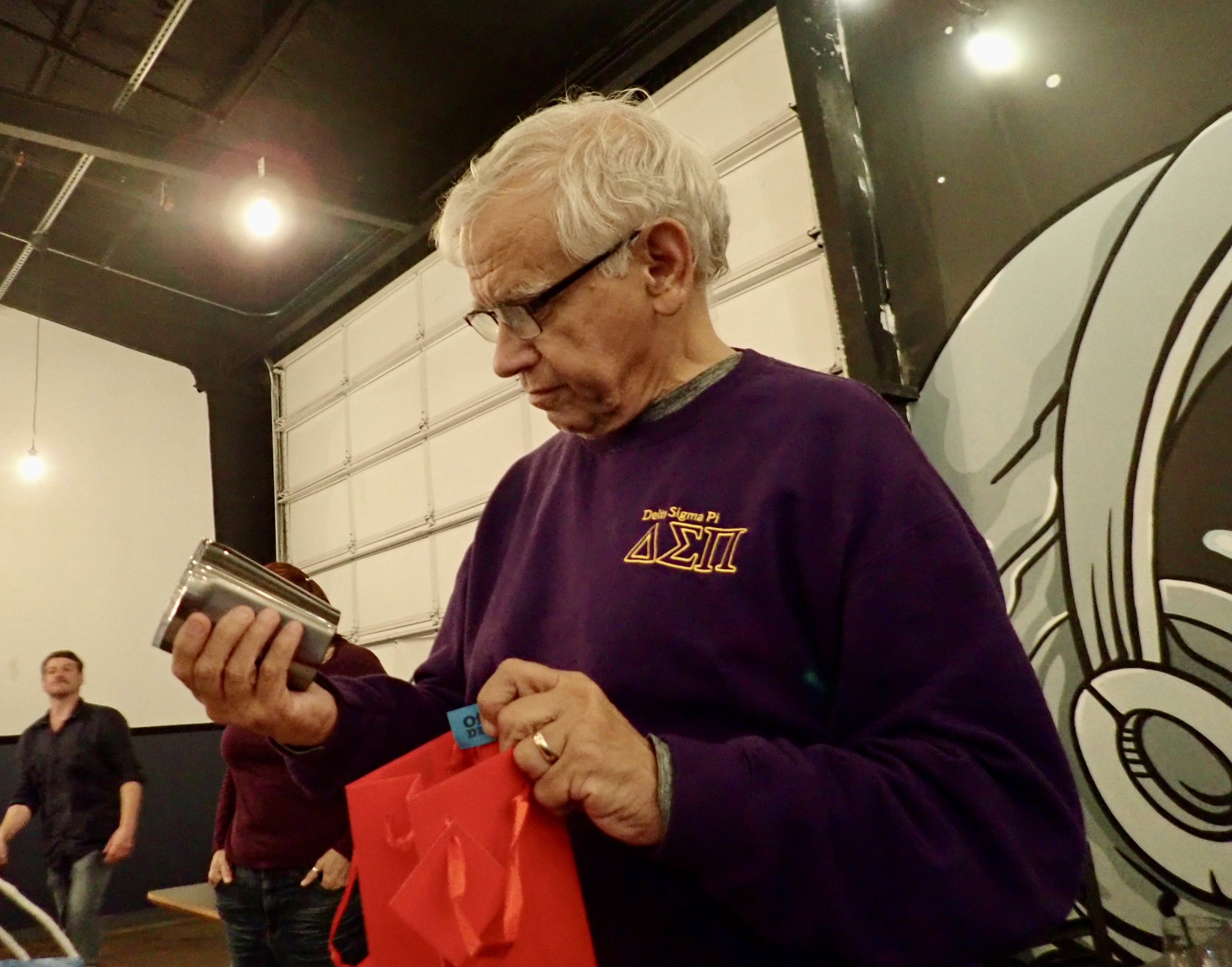 Hawkeye Mark gets a cool cup.