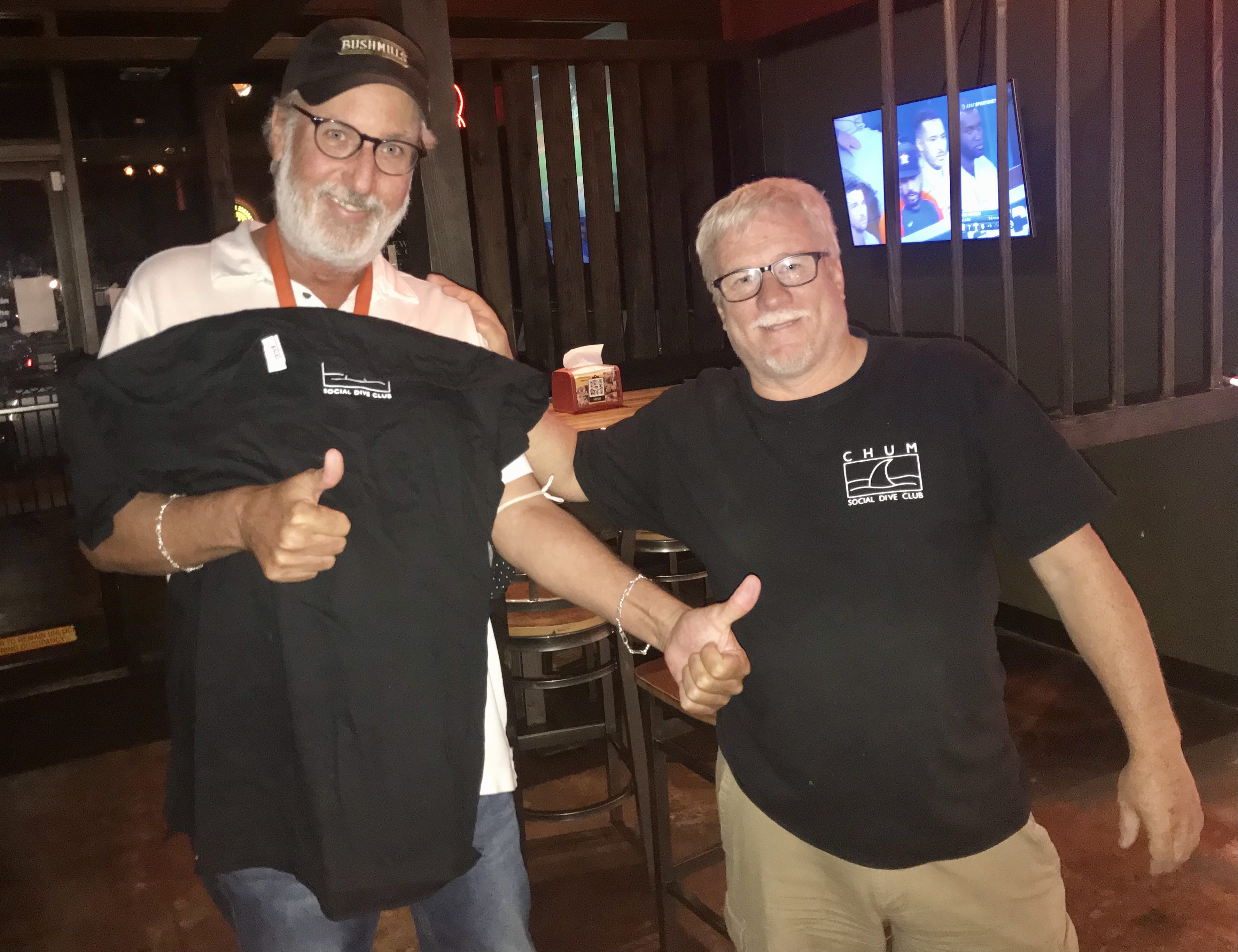 Houston, Jake's bartender gets a CHUM shirt