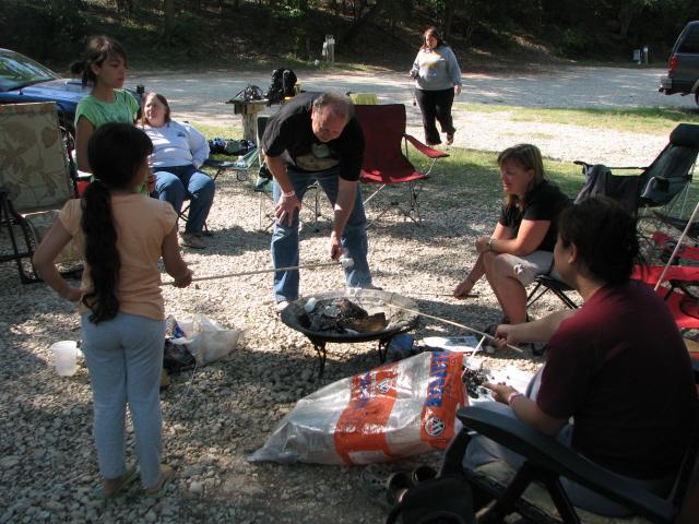 Mr. K-Jenn Diver tending the fire
