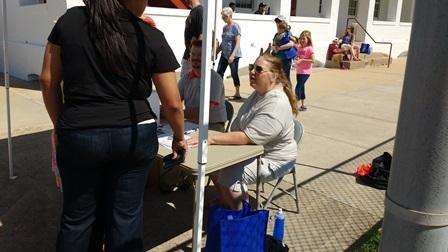 Ms KJenn Dives doing her volunteer thang