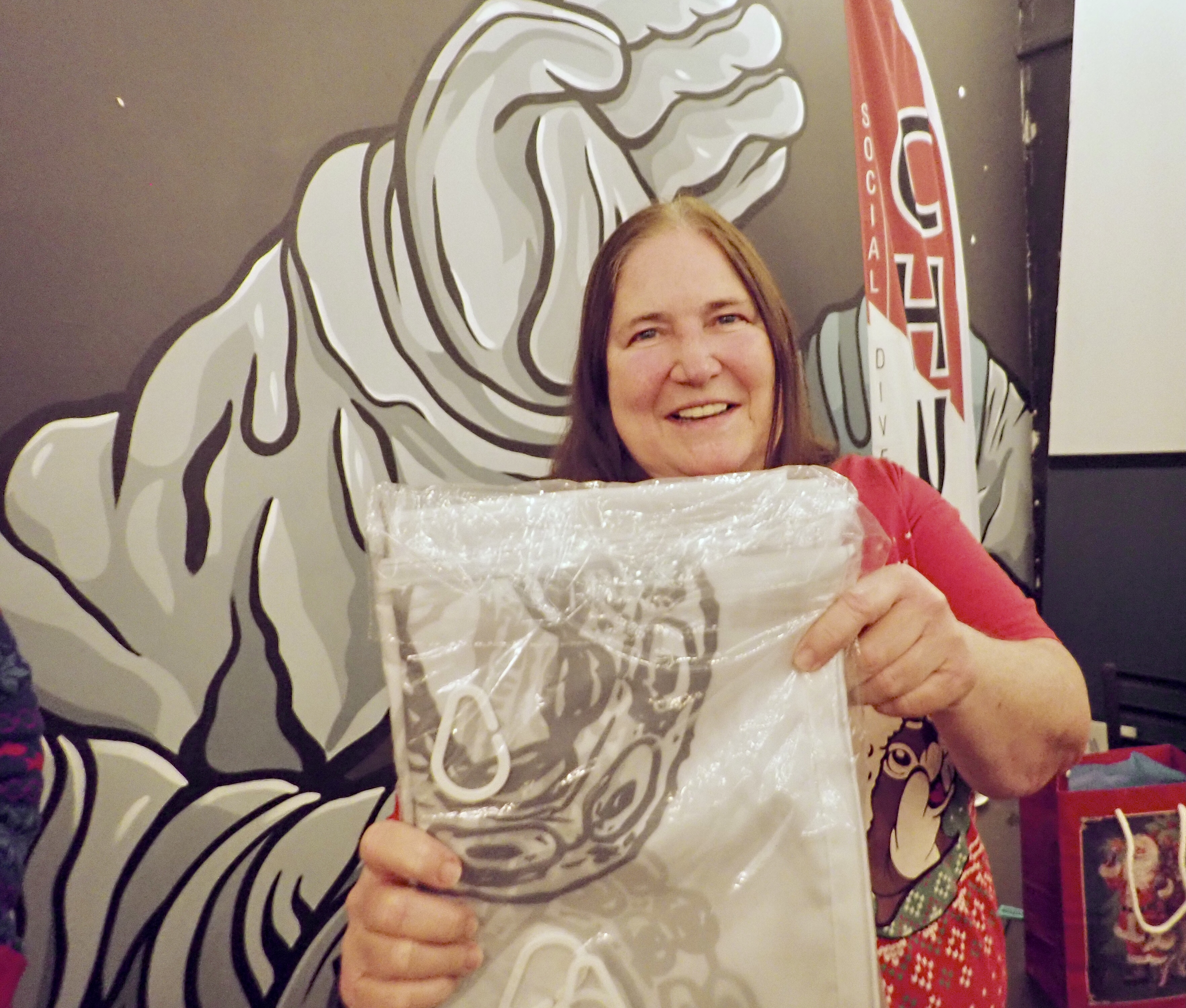 Ms KJenn Dives has an octo shower curtain. For now.