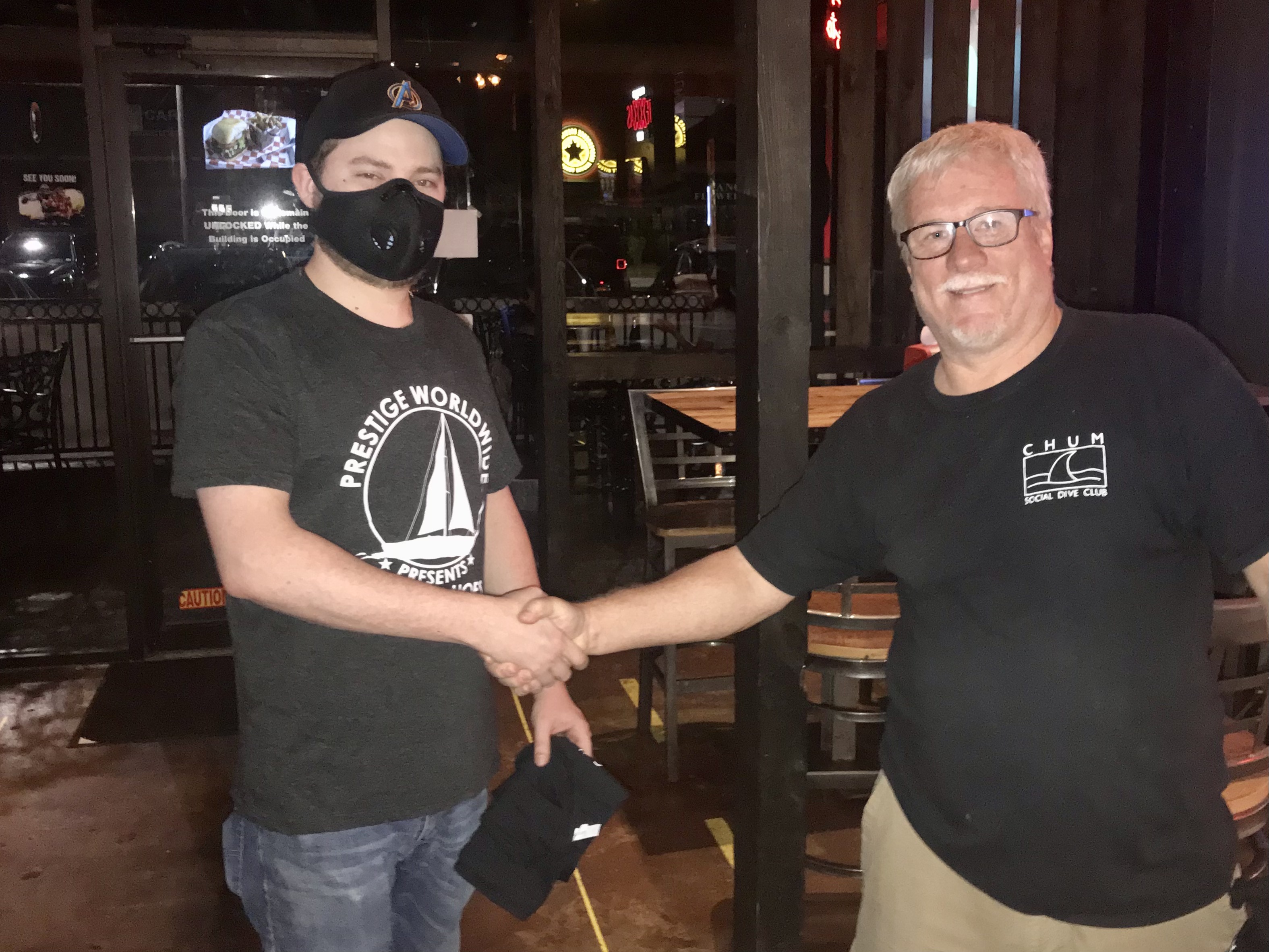 Our bartender gets a CHUM shirt
