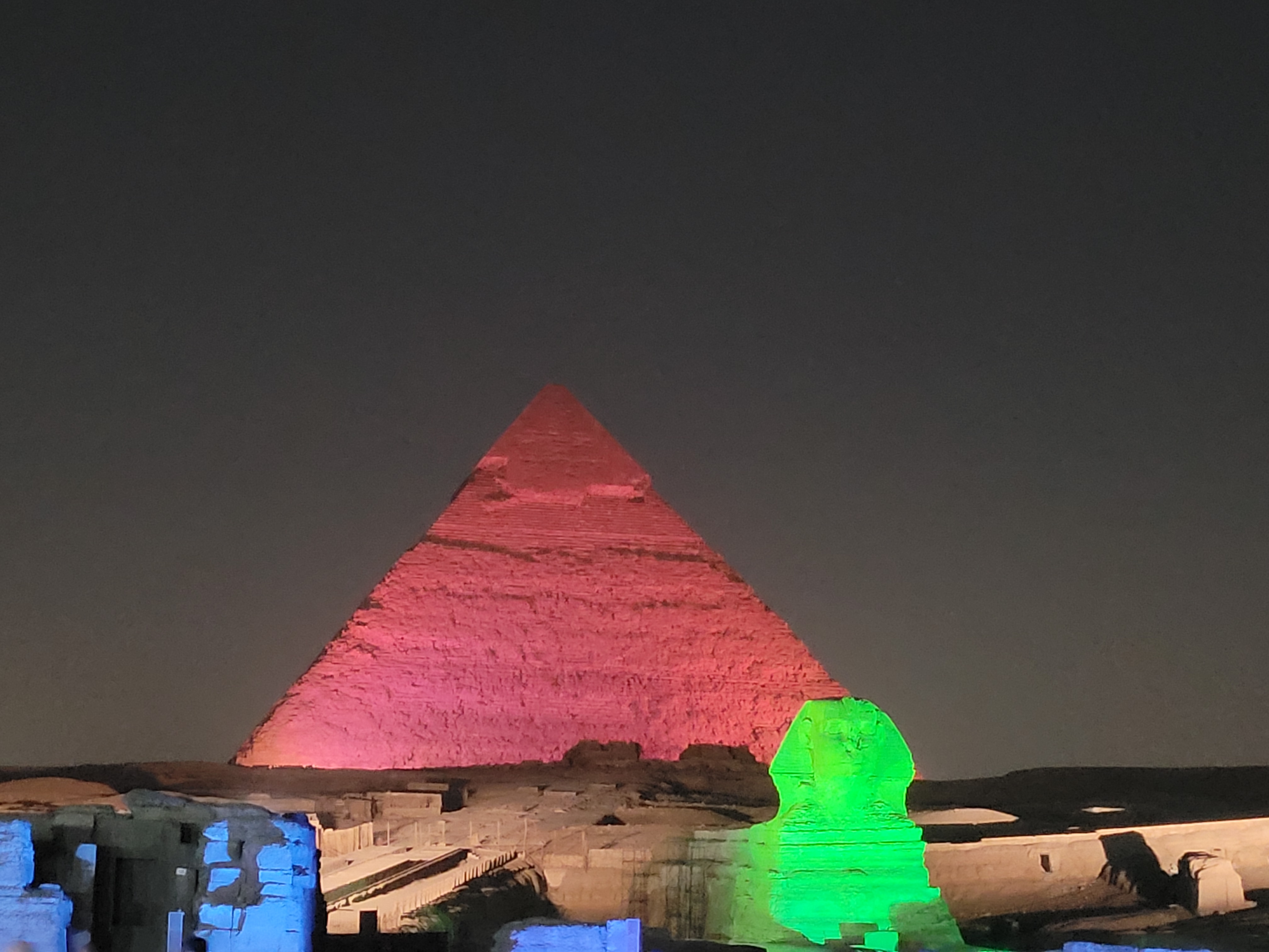 Pyramid and Sphinx at night