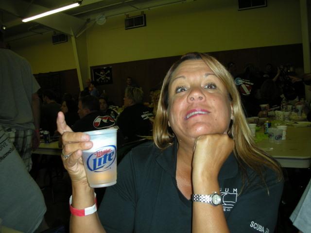 scubagirl represents by getting the last cup of beer