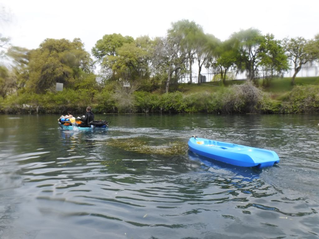 Seaagg05 paddles back upstream after the dive is over