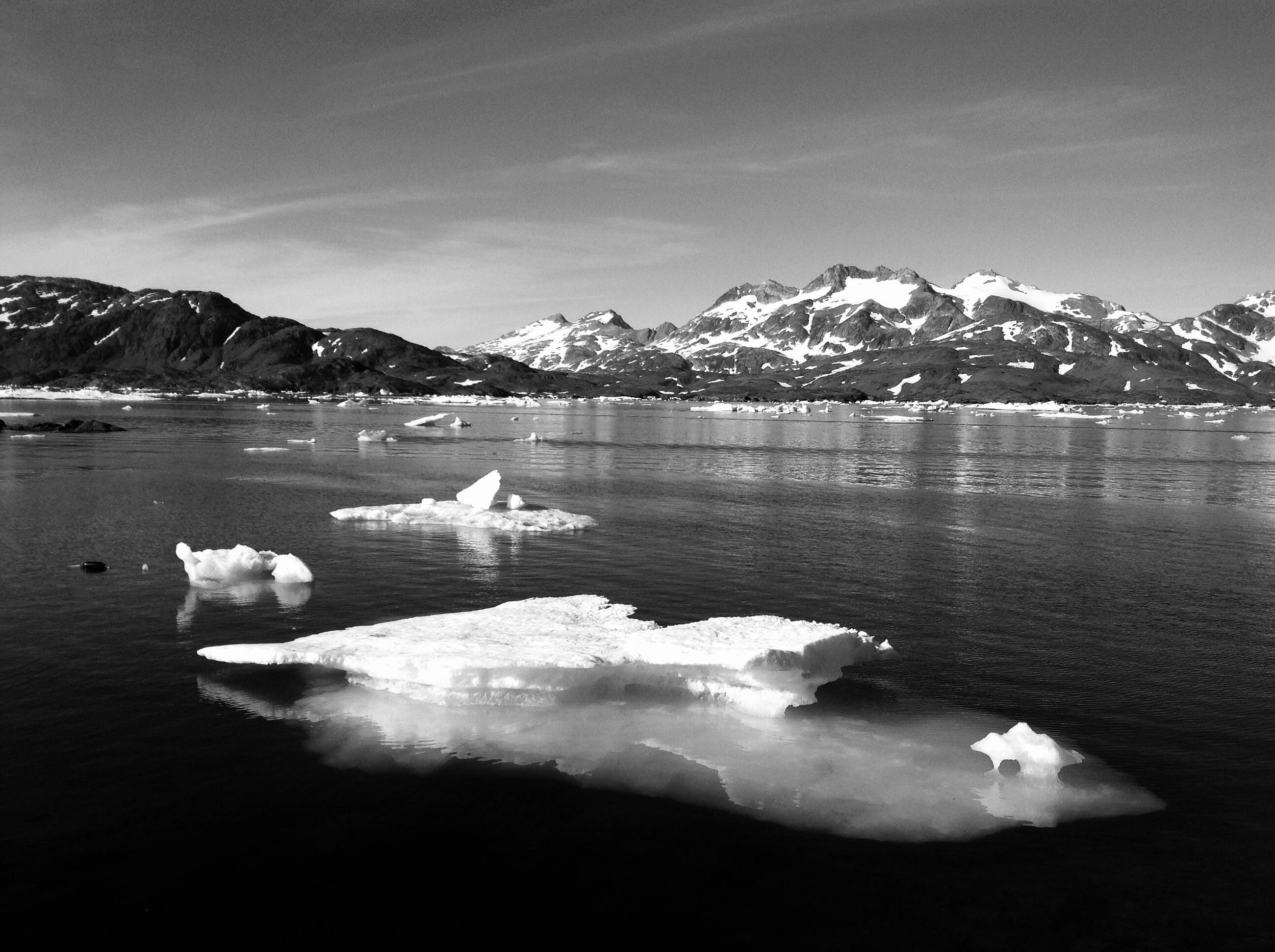 Sitting on the dock of a Greenland Bay