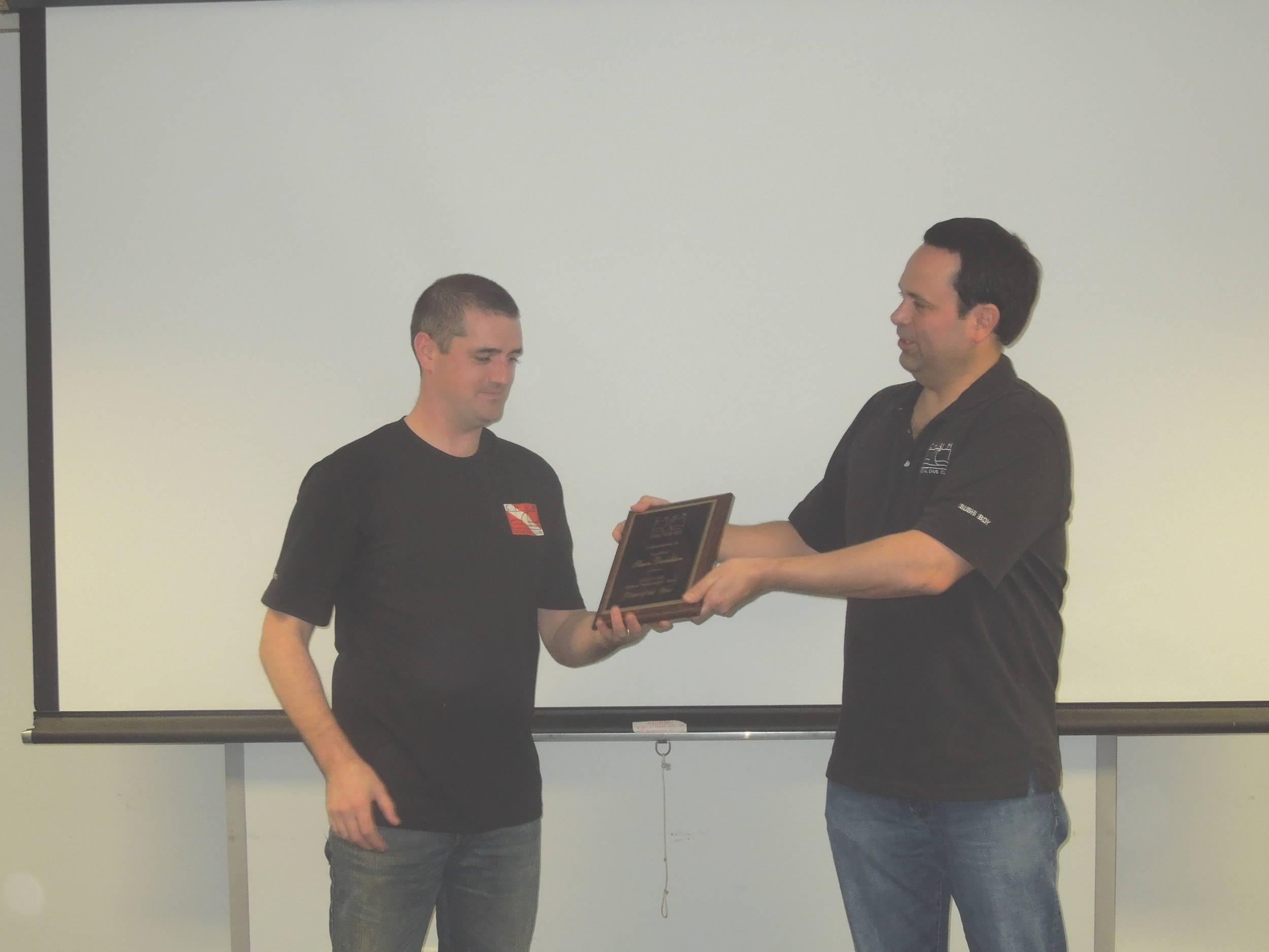 Sushi Boy presenting CHUM's Diver of the Year award to LegoBloxs