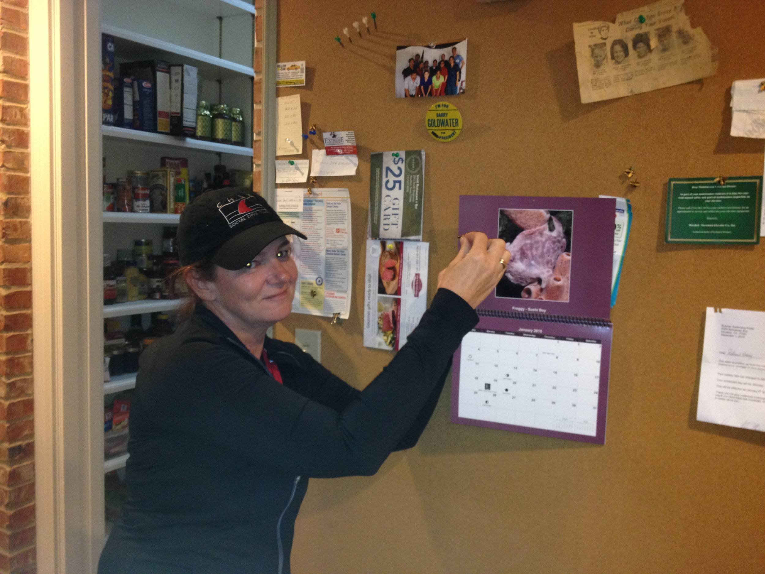 Vanessa makes the new year official by hanging the CHUM calendar