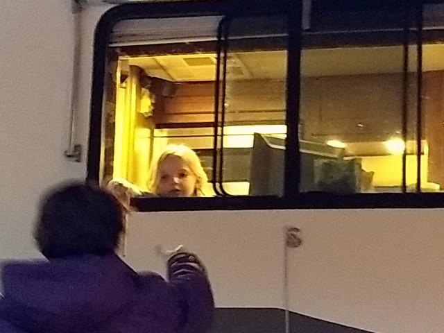 Vivie helping through the window